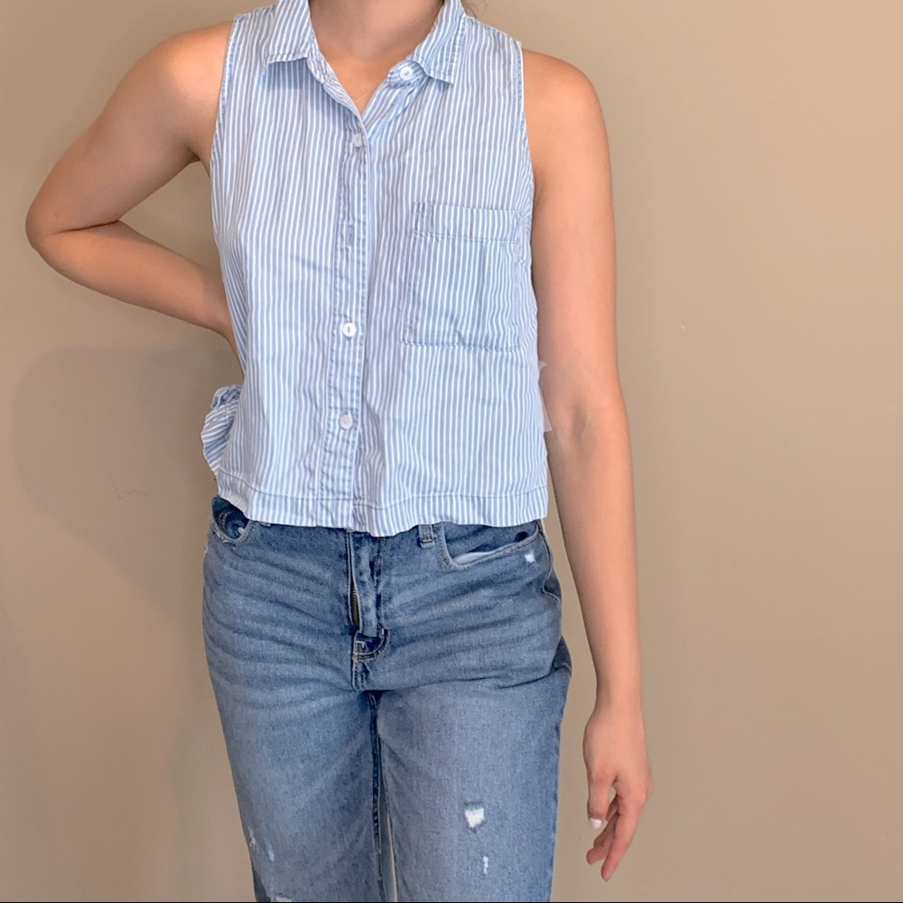 Blue and white striped top with buttons